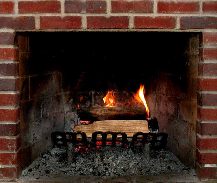 Here is my fireplace.  As I said, it's about 3 feet wide, and does a nice job of warming up the house when the snow flys.  It's great on Halloween and Christmas, too.